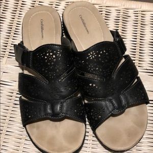 Gently worn black slide sandals